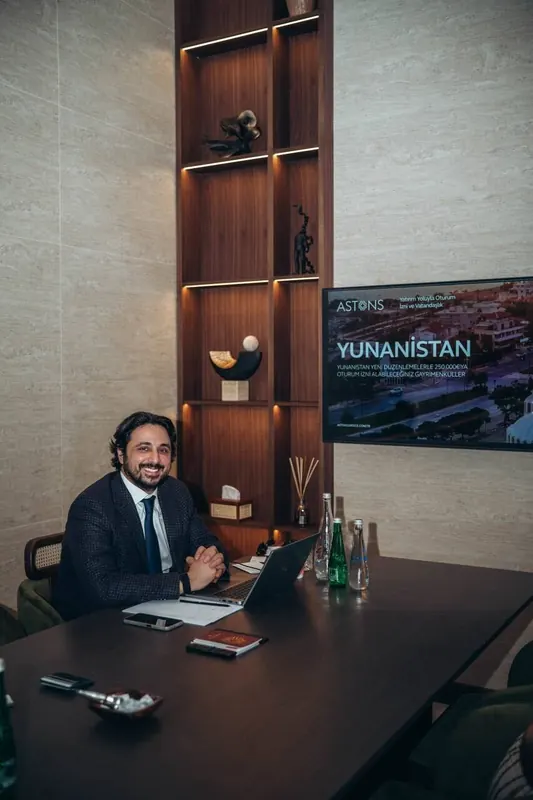 An Astons advisor at a client meeting